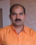Dr. Akhilesh Tiwari